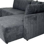 Graue Rundecke Sofa aus Stoff, seitliche Perspektive