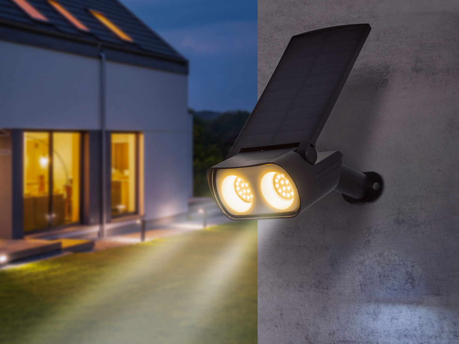 Solarleuchte an einer Wand montiert, beleuchtet einen Gartenweg bei Nacht, seitliche Perspektive