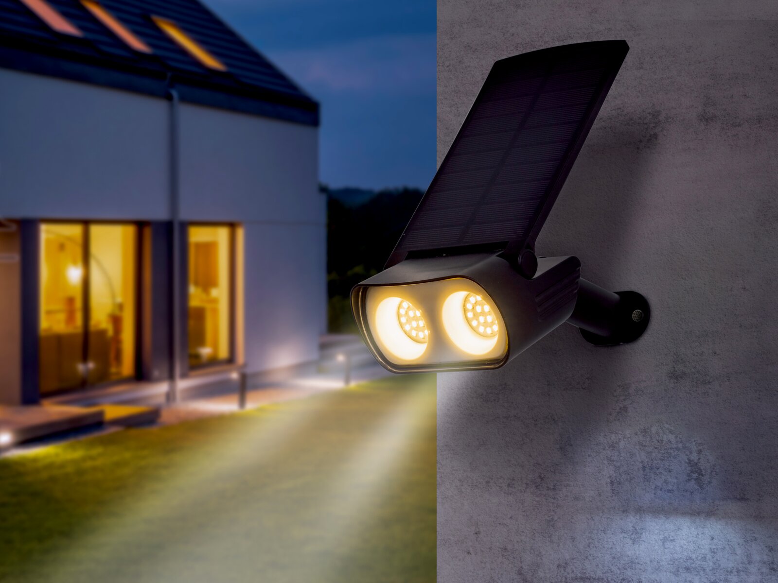 Solarleuchte an einer Wand montiert, beleuchtet einen Gartenweg bei Nacht, seitliche Perspektive