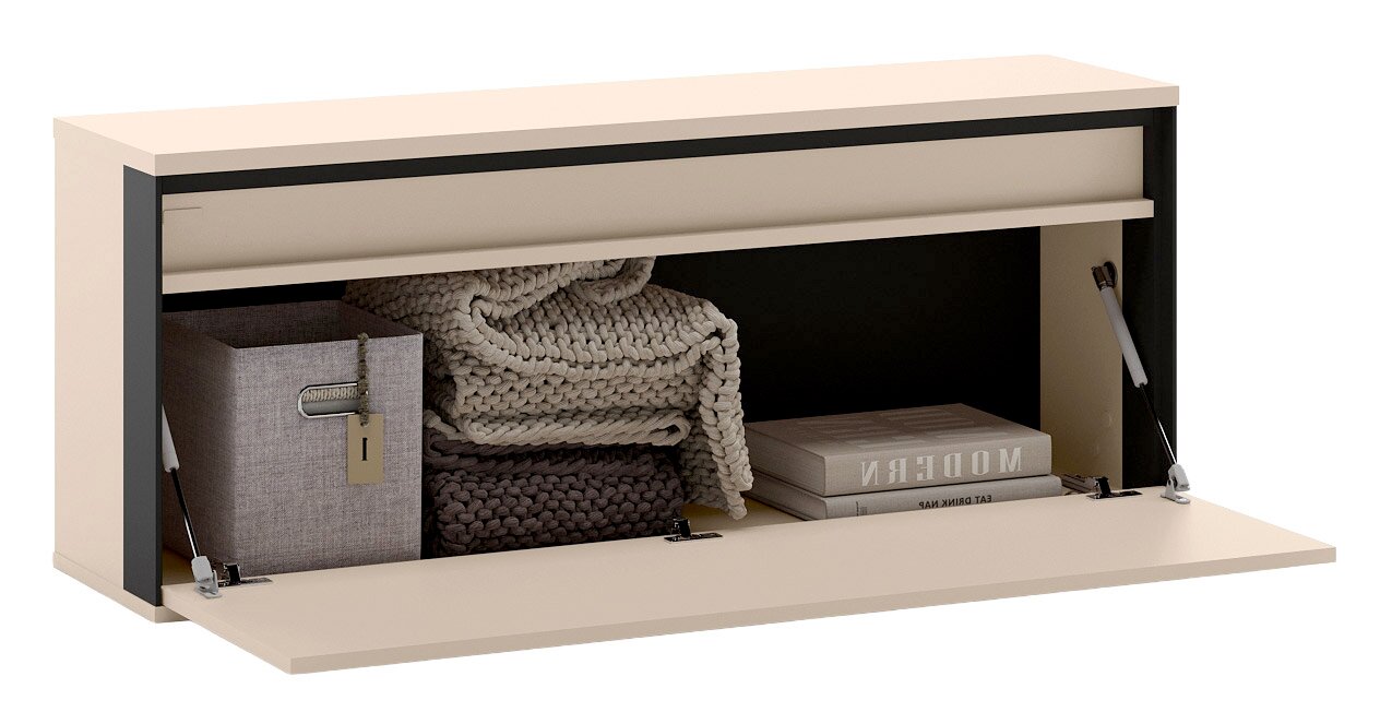 Beige opbergkast met neerklapbare klepdeur en gasveren, open vak met opgevouwen plaids, opbergbox en boek, weergegeven in schuin vooraanzicht (driekwartperspectief) op witte achtergrond