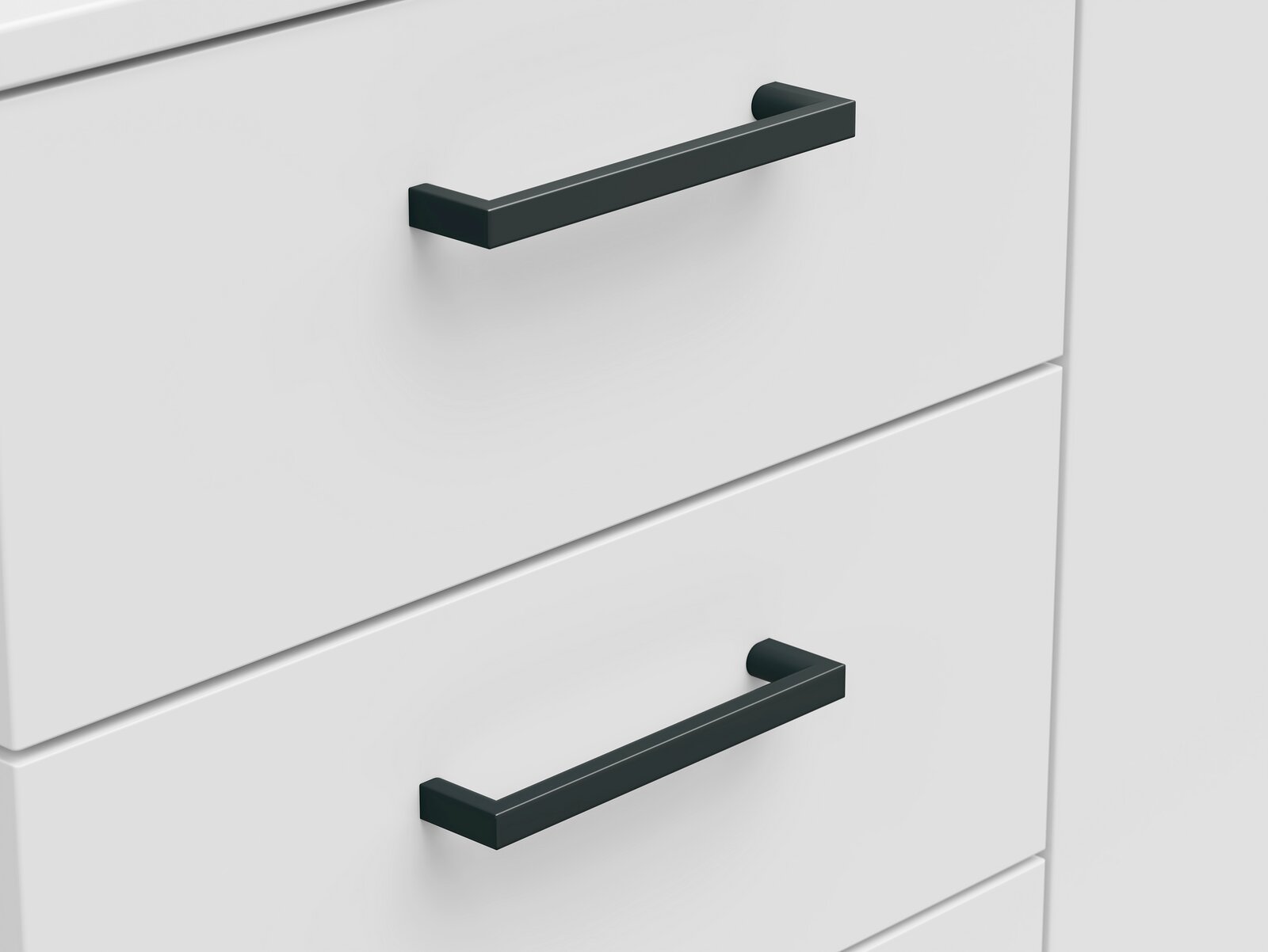 Nahaufnahme von zwei Schubladen einer weißen Kommode mit schwarzen Griffen, seitliche Perspektive