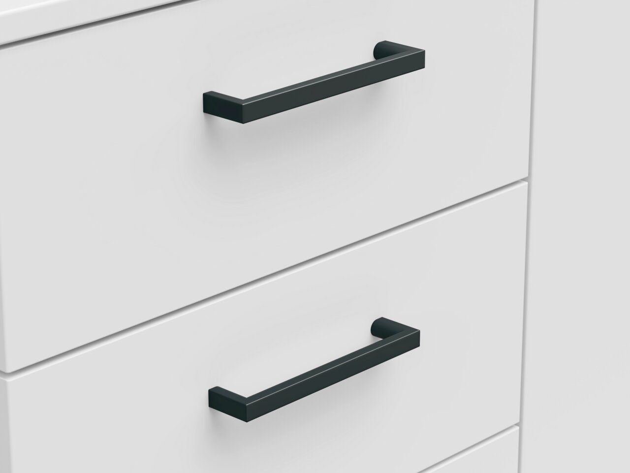 Nahaufnahme von zwei Schubladen einer weißen Kommode mit schwarzen Griffen, seitliche Perspektive