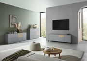 Modernes Wohnzimmer mit grauem TV-Lowboard, Sideboard und Highboard in minimalistischer Einrichtung, seitliche Perspektive