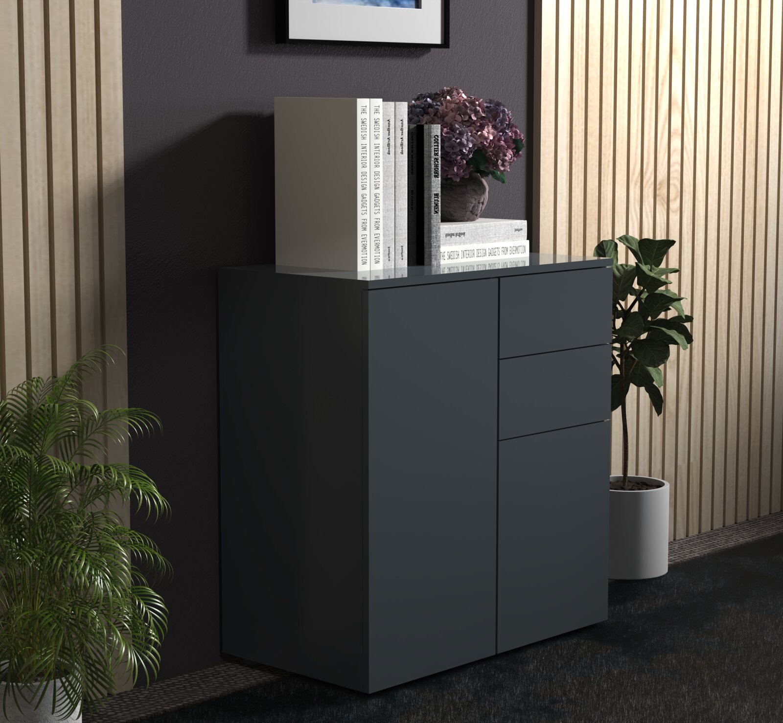 Moderne dunkelgraue Kommode mit Schubladen, dekoriert mit Büchern und Blumenvase, in Wohnraum-Setting Perspektive: frontale Ansicht leicht von links.