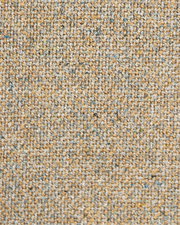 Nahaufnahme eines beige-gemusterten Stoffes, verwendet für einen Stuhlbezug
