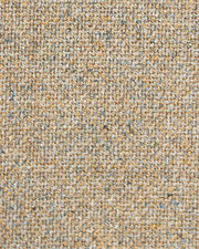 Nahaufnahme eines beige-gemusterten Stoffes, verwendet für einen Stuhlbezug