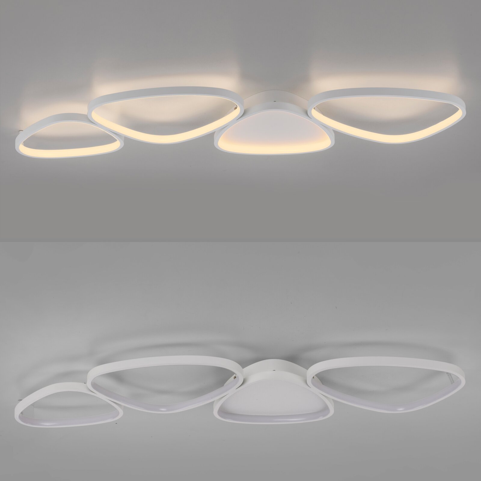 Moderne weiße LED-Deckenleuchte mit vier organisch geformten, ringförmigen Lichtflächen und warmweißem Licht, Ansicht von unten (Untersicht) an der Decke montiert.
