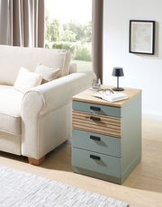 Rollcontainer mit drei Schubladen in einem modernen Wohnzimmer, seitliche Perspektive