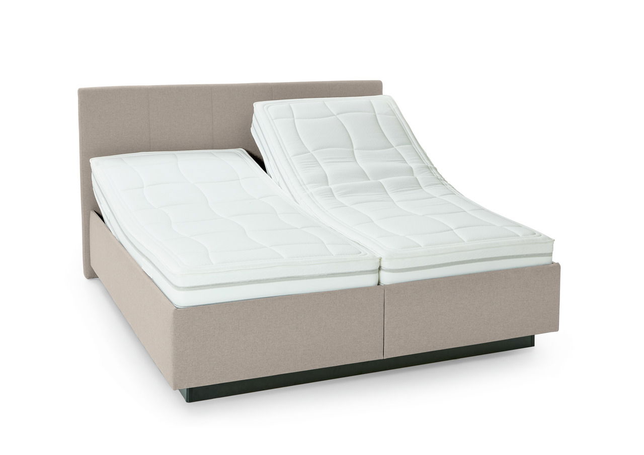 Polsterbett mit verstellbaren Matratzen, seitliche Perspektive