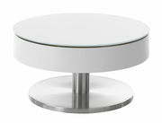 Moderner runder Couchtisch SUVA mit weißer Tischplatte und verchromtem Sockel, seitliche Perspektive.