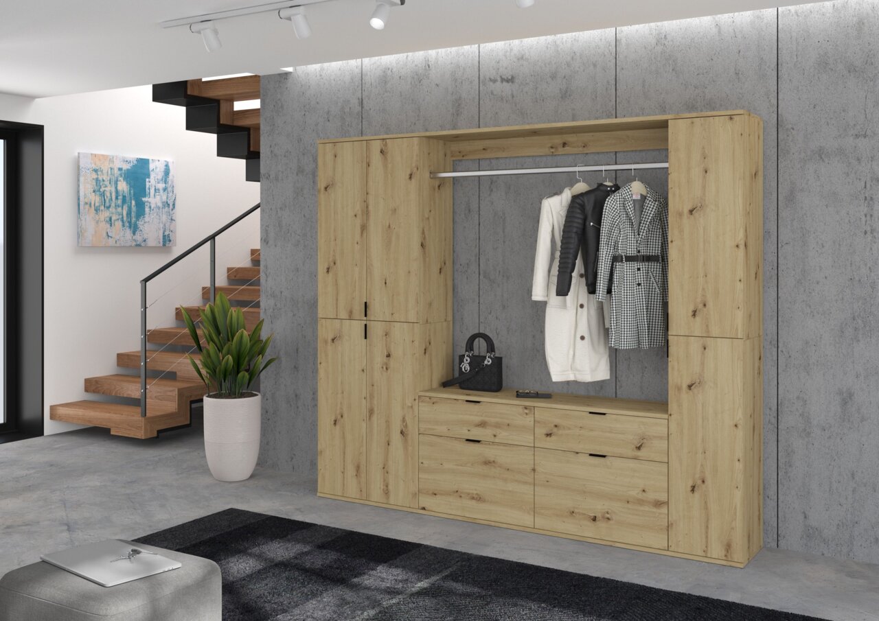 Moderne Kommode aus Holz mit Kleiderstange und Schubladen, frontal fotografiert in einem stilvollen Wohnraum.