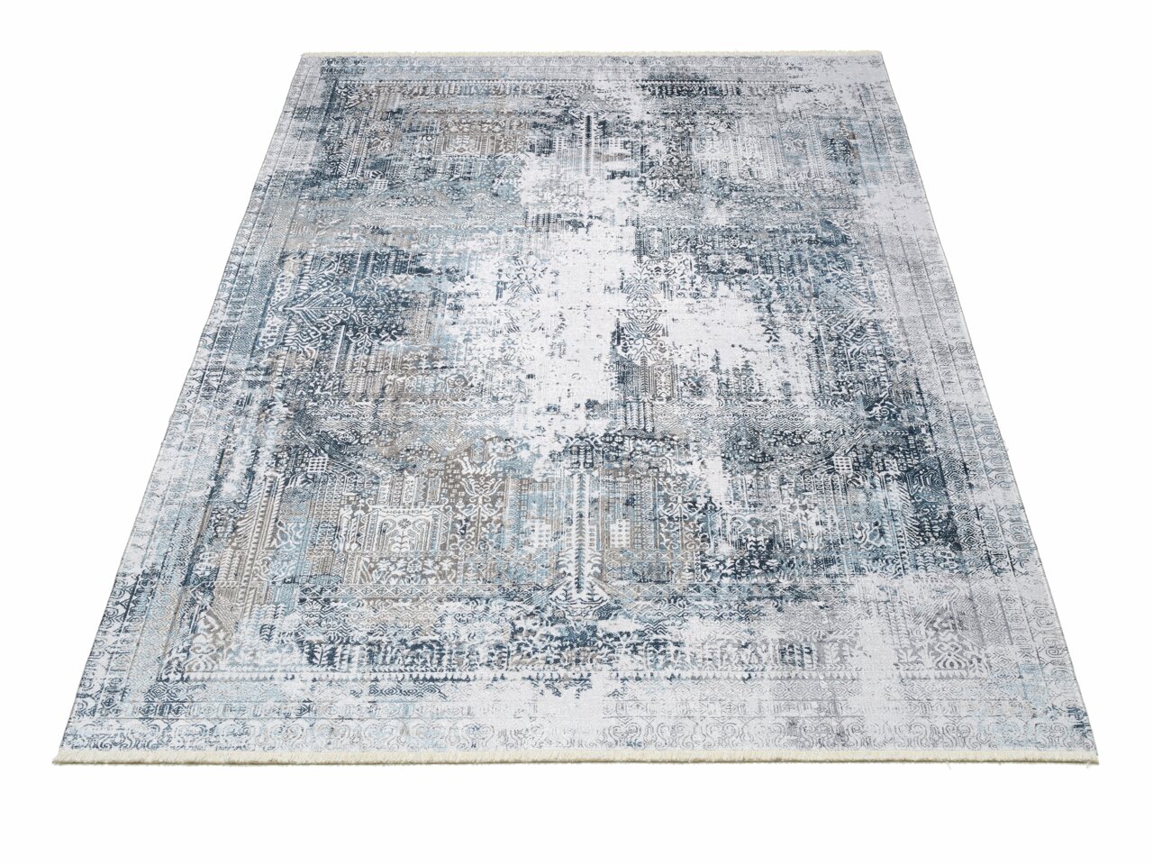 Teppich Vision Yama in Blau- und Grautönen, Größe ca. 160x230cm, aus schräger Perspektive fotografiert
