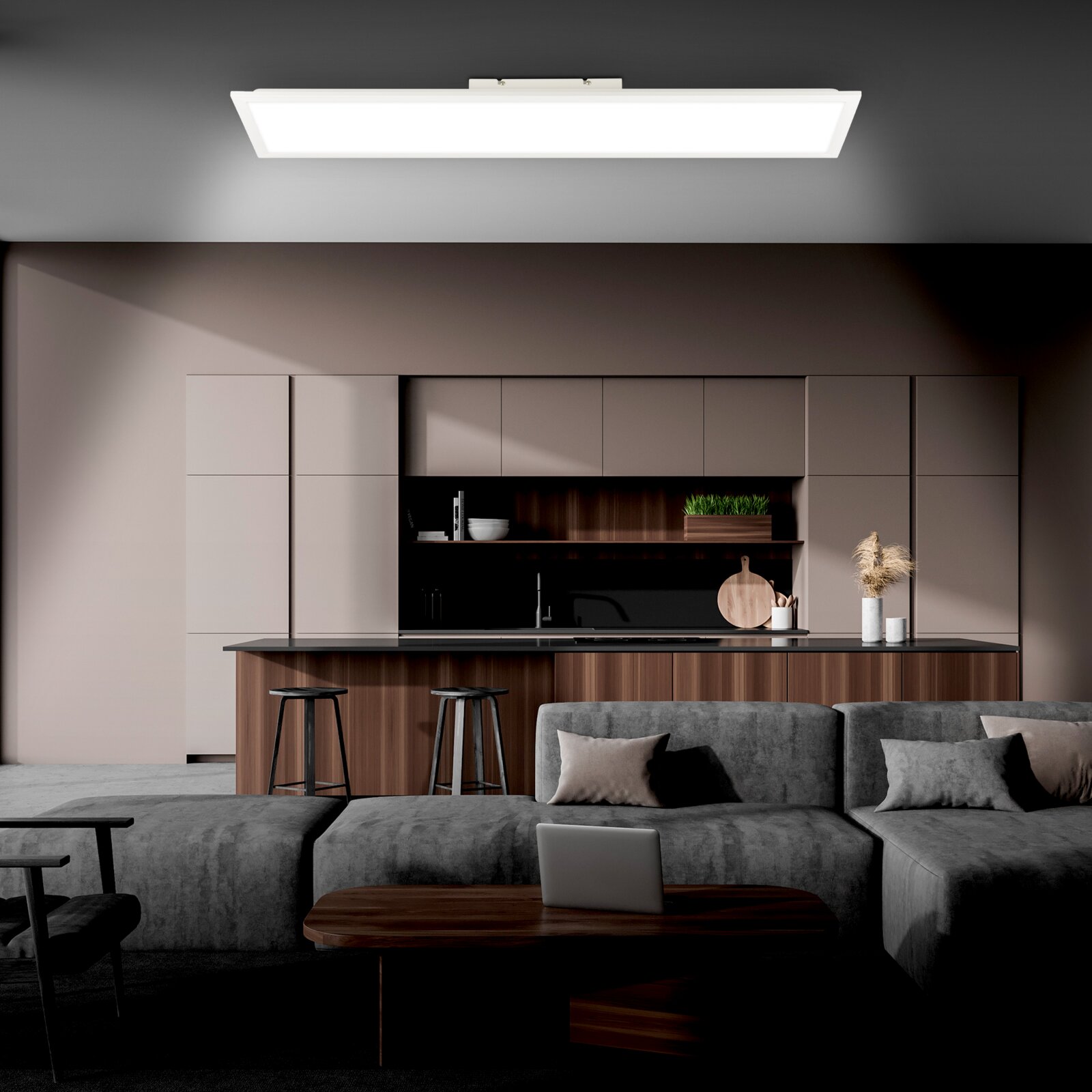 Wit rechthoekig LED plafondpaneel in moderne keuken-woonkamer, gezien van onderen in licht schuin frontaal perspectief
