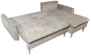 Beige Ecksofa mit Holzfüßen, von oben betrachtet, in ausgeklappter Position.