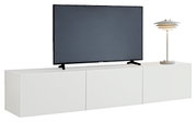 Wit hangend tv-meubel met een televisie en een moderne tafellamp, vooraanzicht
