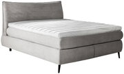 Boxspringbett 180x200 in grauem Stoff mit gestepptem Kopfteil, seitliche Perspektive
