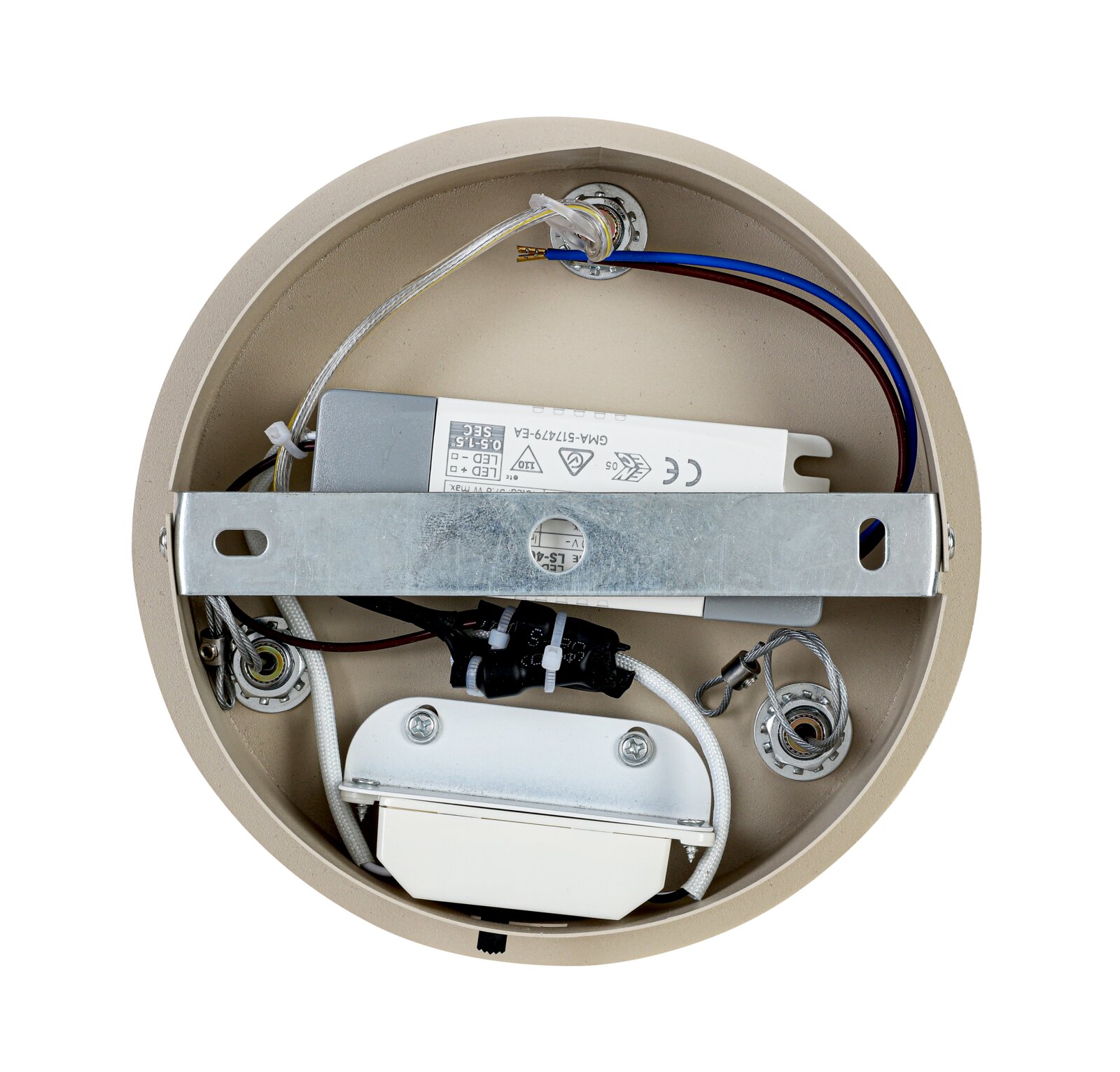 Bovenaanzicht van de binnenkant van een ronde LED-hanglamp met zichtbare elektrische onderdelen en bedrading.