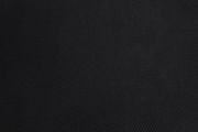 Nahaufnahme eines schwarzen Stoffes mit feiner Struktur, verwendet für einen Drehstuhl.