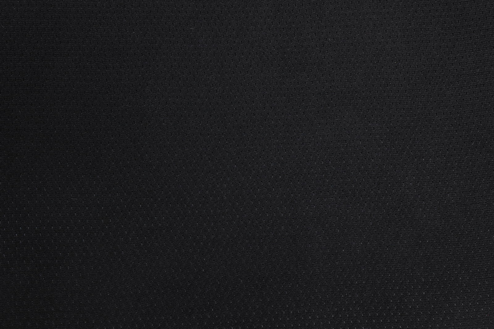 Nahaufnahme eines schwarzen Stoffes mit feiner Struktur, verwendet für einen Drehstuhl.