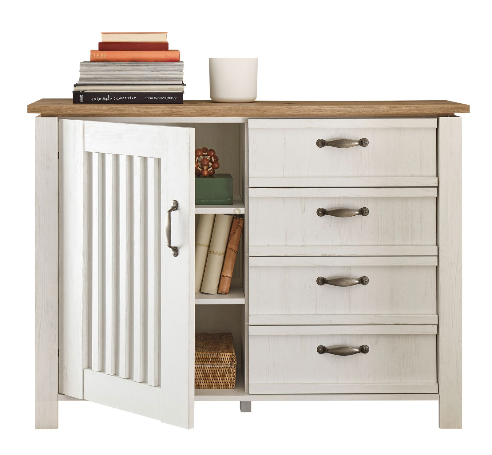 Weiße Kommode mit drei Schubladen und einer Tür, teilweise geöffnet, mit Büchern und Dekoration darauf, aus frontaler Perspektive.