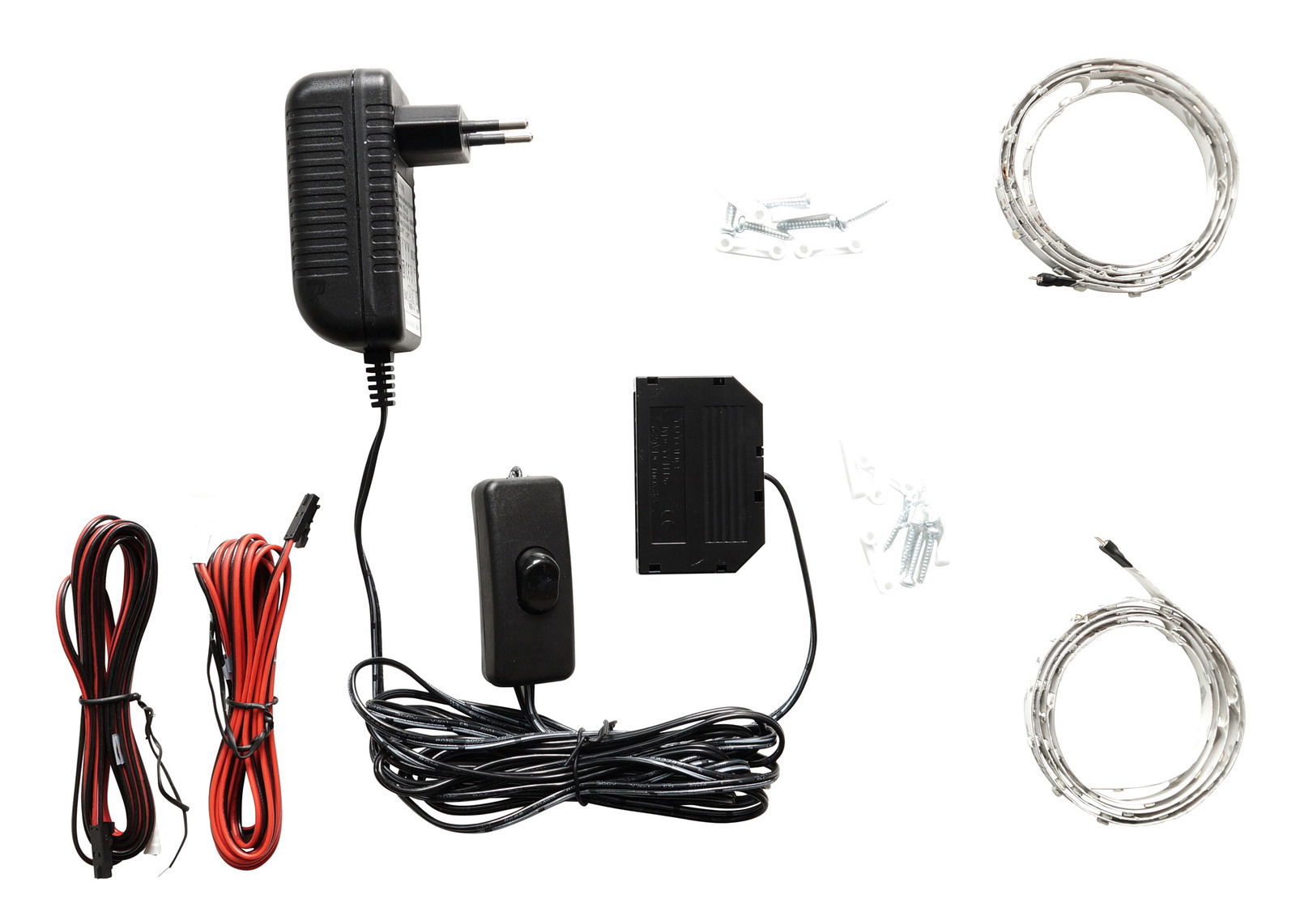 Novel LED-Bandbeleuchtung MATADI LED-Bandbeleuchtung Set mit Netzteil, Steuerungseinheit, Kabeln und Montagematerial, aus der Vogelperspektive fotografiert.