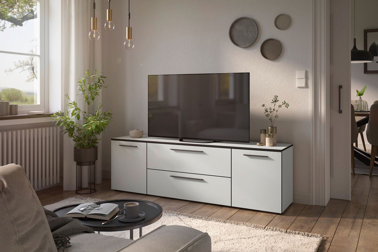 Modernes TV-Lowboard in einem stilvollen Wohnzimmer, seitliche Perspektive