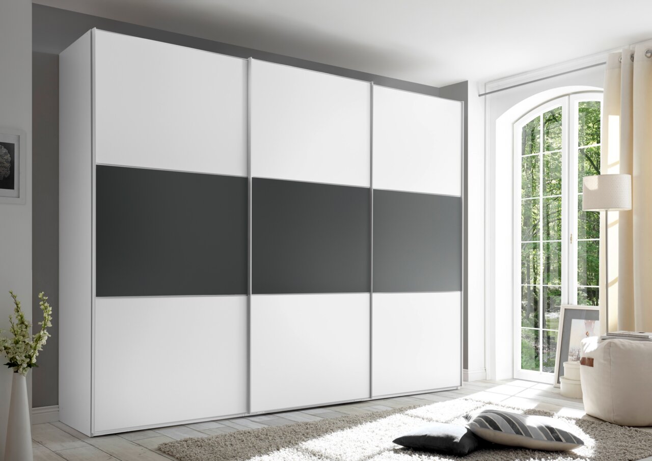 Moderano Schwebetürenschrank Serie PRIMO in modernem Design mit weißen und grauen Paneelen, seitliche Perspektive.