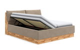 Polsterbett mit hochgeklappter Matratze und Stauraum, seitliche Perspektive
