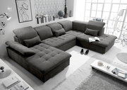 Graue Rundecke (U) in einem modernen Wohnzimmer, Perspektive von oben links.