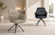 Twee moderne fauteuils in taupe en zwart met comfortabele bekleding en zwarte sterpoten, weergegeven vanuit schuin vooraanzicht en recht vooraanzicht in een licht interieur.
