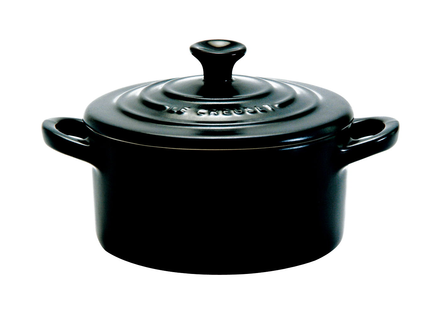 Schwarze Mini-Cocotte aus Gusseisen mit Deckel und seitlichen Griffen, seitliche Perspektive