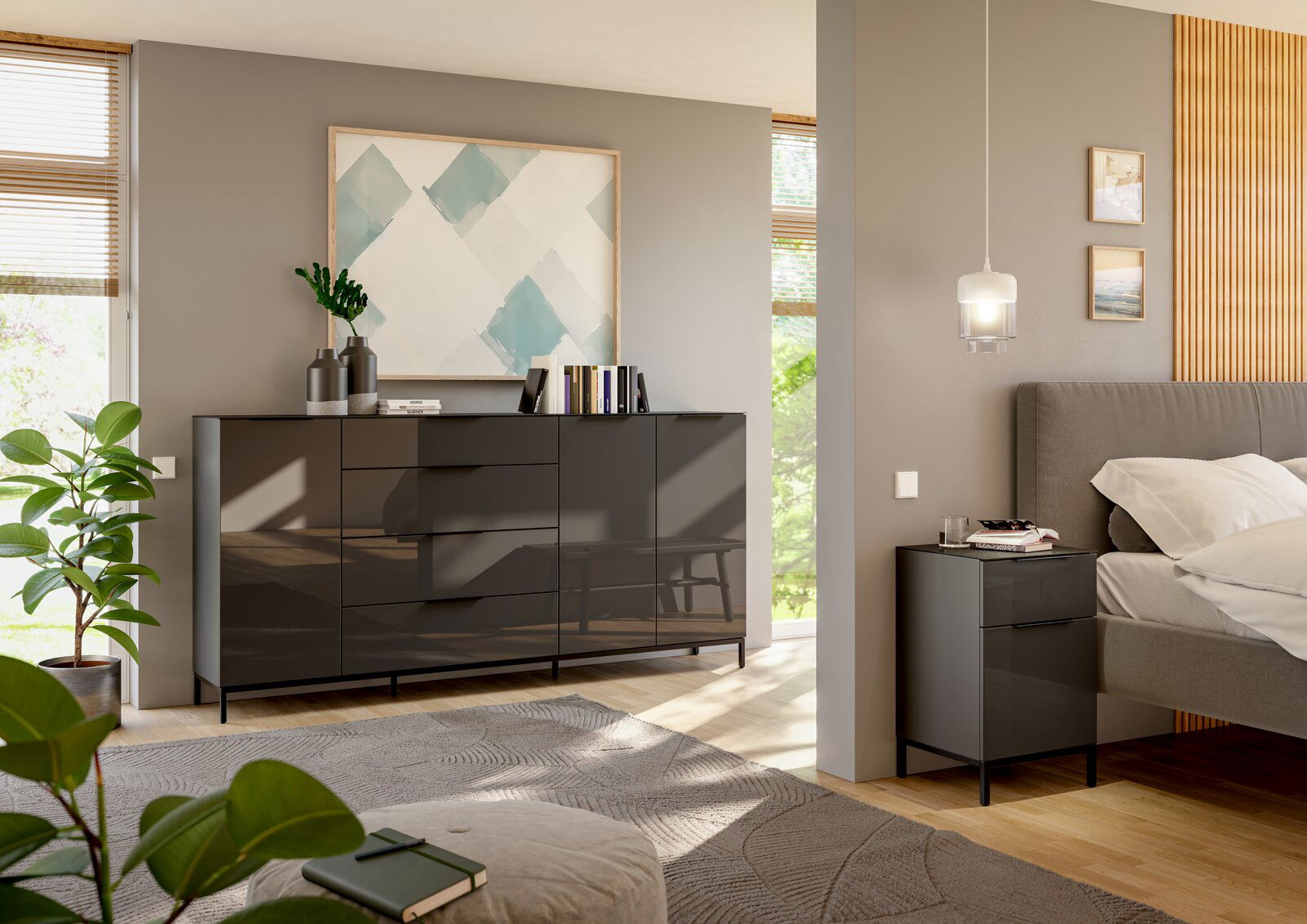 Modernes Schlafzimmer mit einem großen, glänzenden Sideboard und einer passenden Nachtkommode in dunklem Design, seitliche Perspektive.