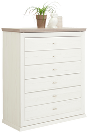 Weiße Kommode mit sechs Schubladen, dekoriert mit einer Pflanze, einer Eulenfigur und einem Korb, seitliche Perspektive