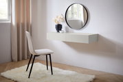Moderne wandconsole in een lichte ruimte, gezien vanaf de zijkant, met een ronde spiegel en decoratie.