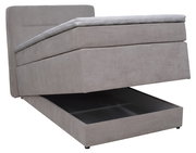 Boxspringbett mit geöffnetem Stauraum, seitliche Perspektive
