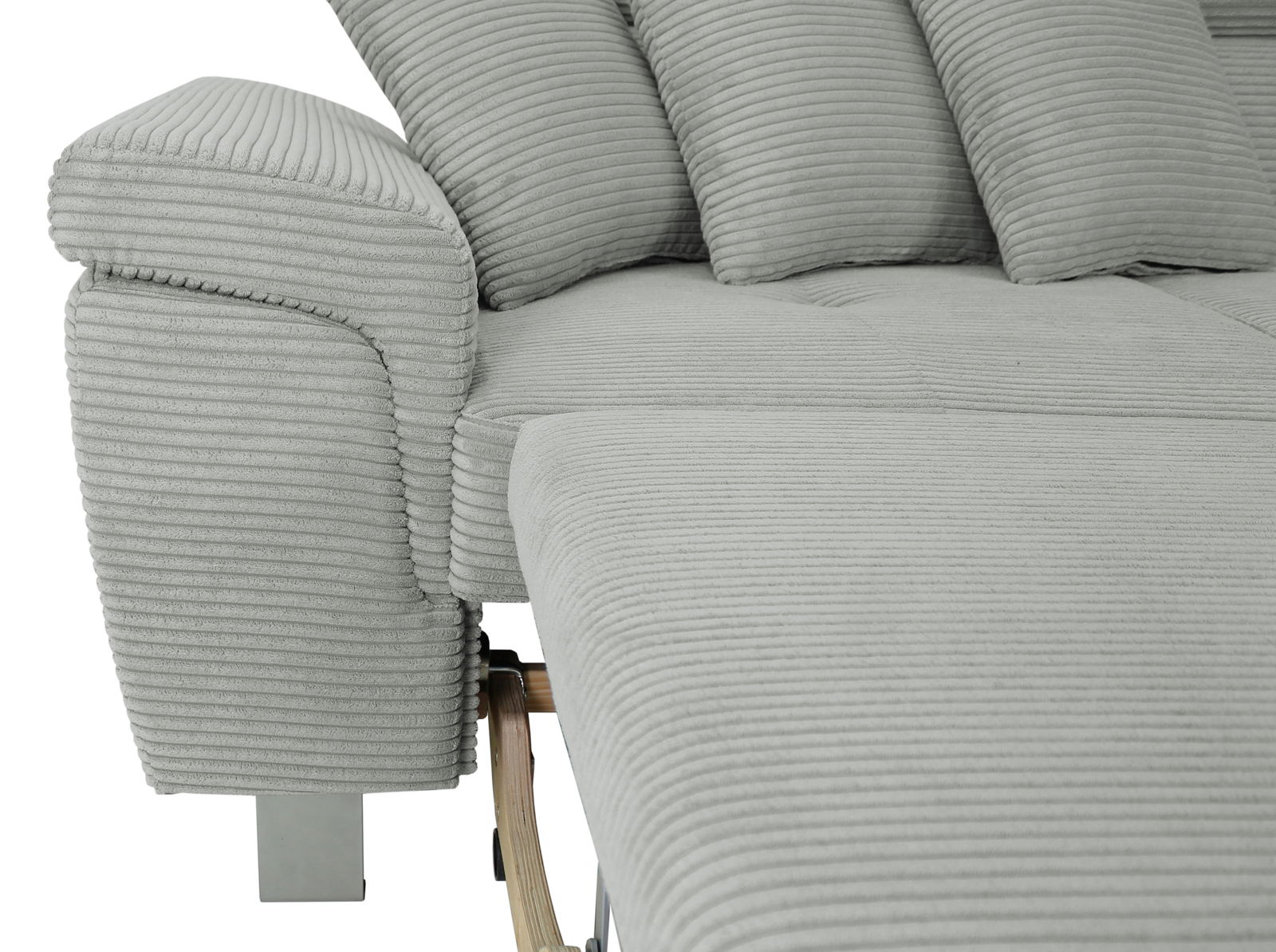 Nahaufnahme einer grauen, gerippten Rundecke mit Armlehne und Kissen, seitliche Perspektive.