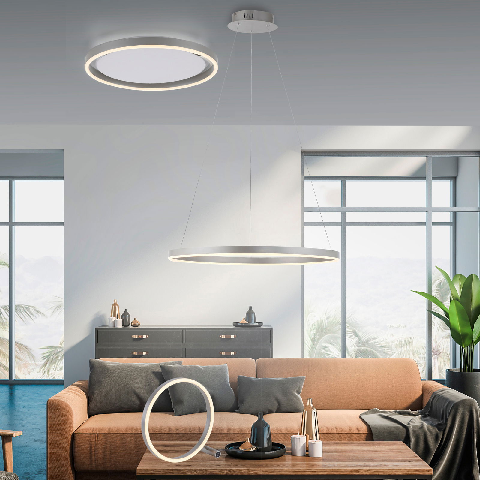 Moderne Wohnzimmeransicht mit drei stilvollen RITUS-Leuchten: Deckenleuchte, Pendelleuchte und Tischleuchte in einem eleganten, hellen Raum.