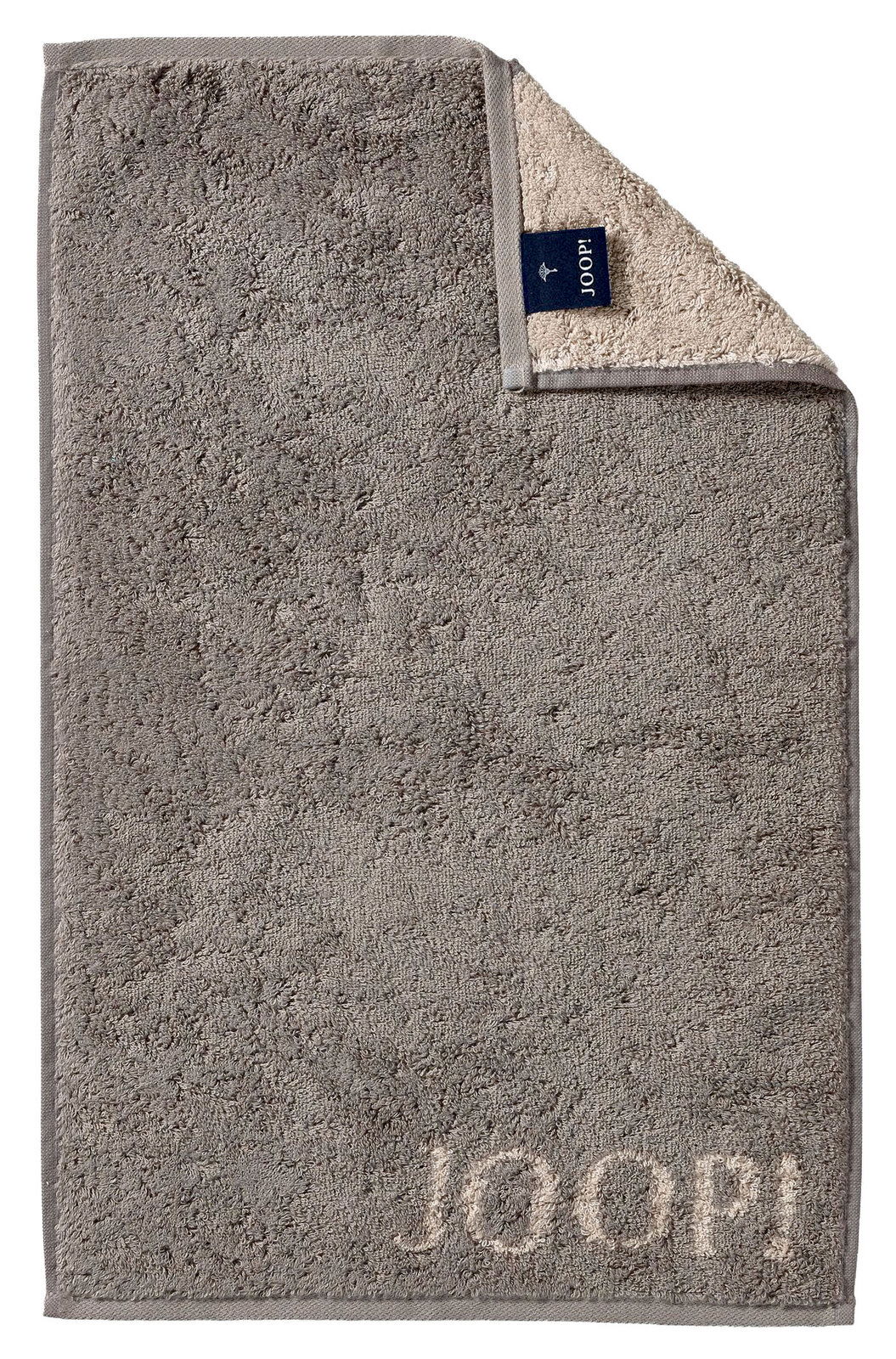 Graues Gästetuch mit eingewebtem 'JOOP!' Logo, ausgebreitet mit umgeschlagener Ecke, die die Rückseite zeigt.