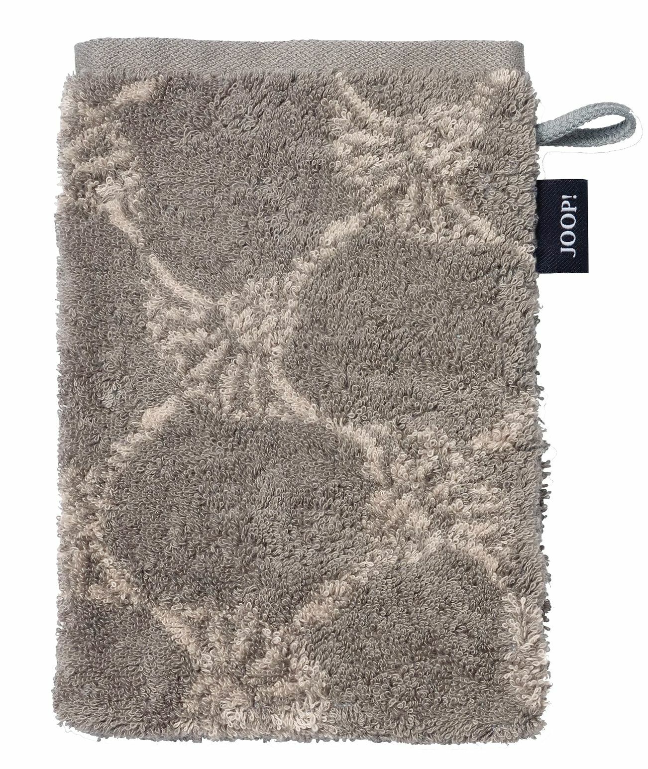 Grauer Waschhandschuh mit floralem Muster, von oben fotografiert, mit einer Schlaufe und einem Markenetikett an der Seite.