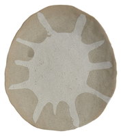 Rundes Ornament mit unregelmäßigem, weißem Muster auf beiger Oberfläche, Draufsicht