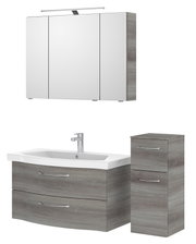 Badezimmermöbel-Set bestehend aus einem Spiegelschrank, einem Waschbeckenunterschrank mit zwei Schubladen und einem hohen Schrank, in Holzoptik, aus der Frontalperspektive.