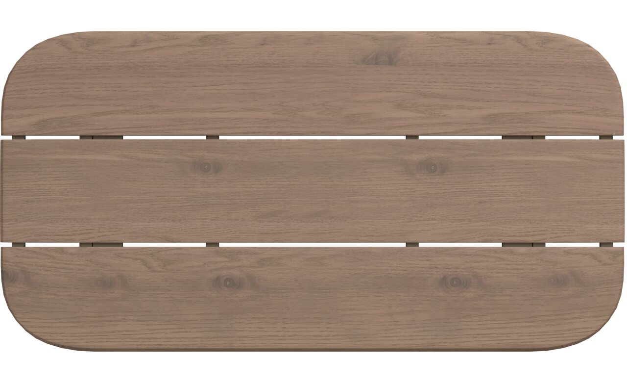Draufsicht auf eine rechteckige Tischplatte aus Holz mit abgerundeten Ecken und sichtbarer Holzmaserung.