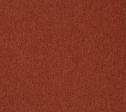 Nahaufnahme eines roten Stoffmusters, verwendet für einen Stuhl.