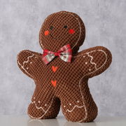 Türstopper in Form eines Lebkuchenmanns mit roter Fliege und Herzverzierungen, Frontalansicht.