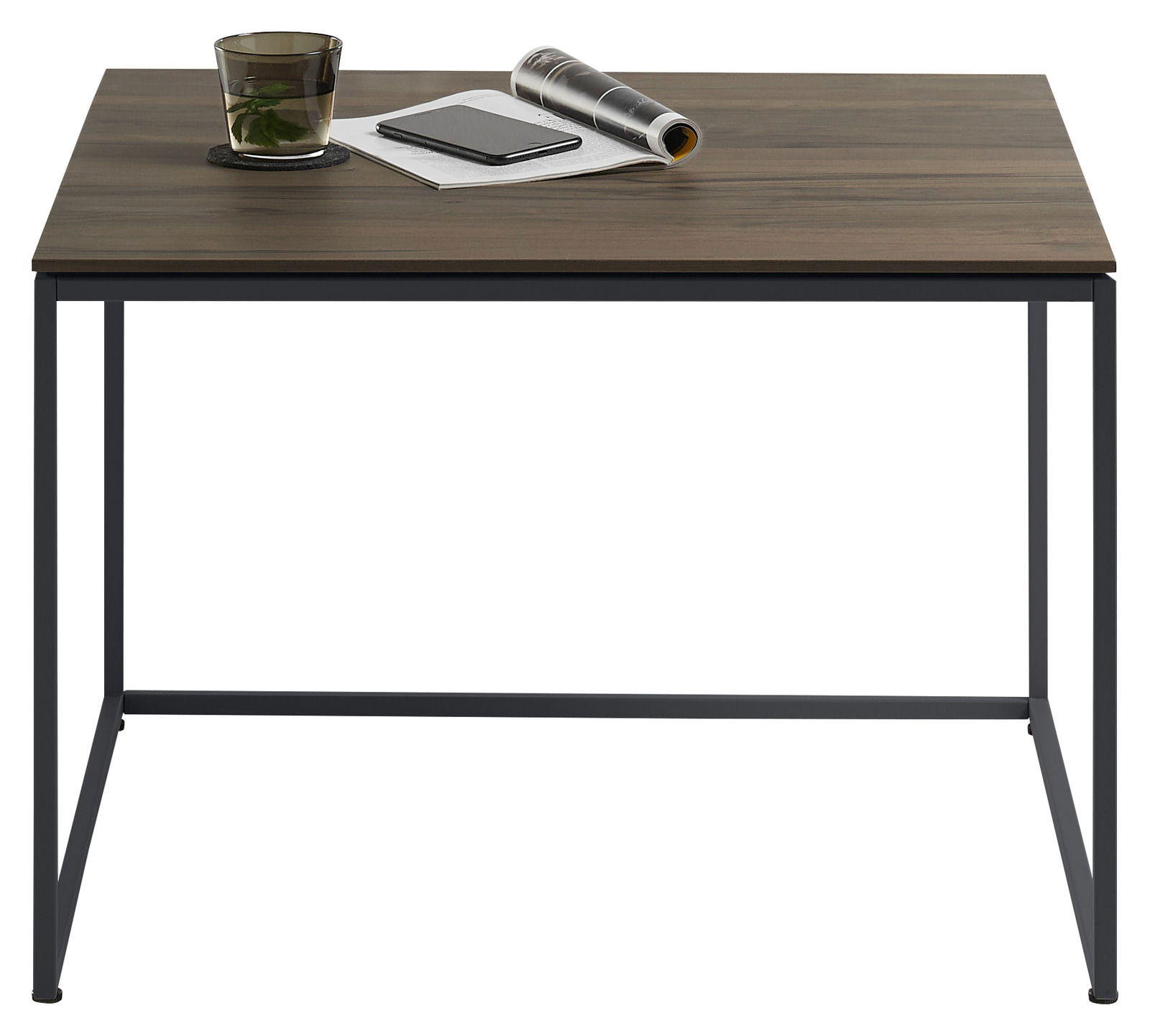 Johann Jakob Beistelltisch LANDO Moderner Beistelltisch mit dunkler Holzplatte und schwarzem Metallgestell, frontal fotografiert. Auf dem Tisch stehen ein Glas, ein Notizbuch und eine zusammengerollte Zeitschrift.