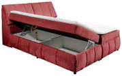 Rotes Boxspringbett mit geöffnetem Bettkasten, seitliche Perspektive