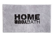Grauer Badteppich mit schwarzem Schriftzug 'HOME YOUR BATH', von oben betrachtet.