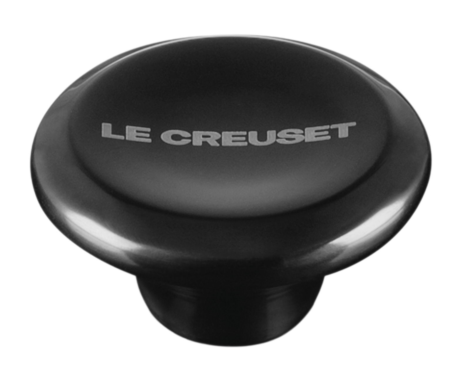 Schwarzer Deckelknopf aus Nickel mit der Aufschrift 'Le Creuset', Ansicht von oben.