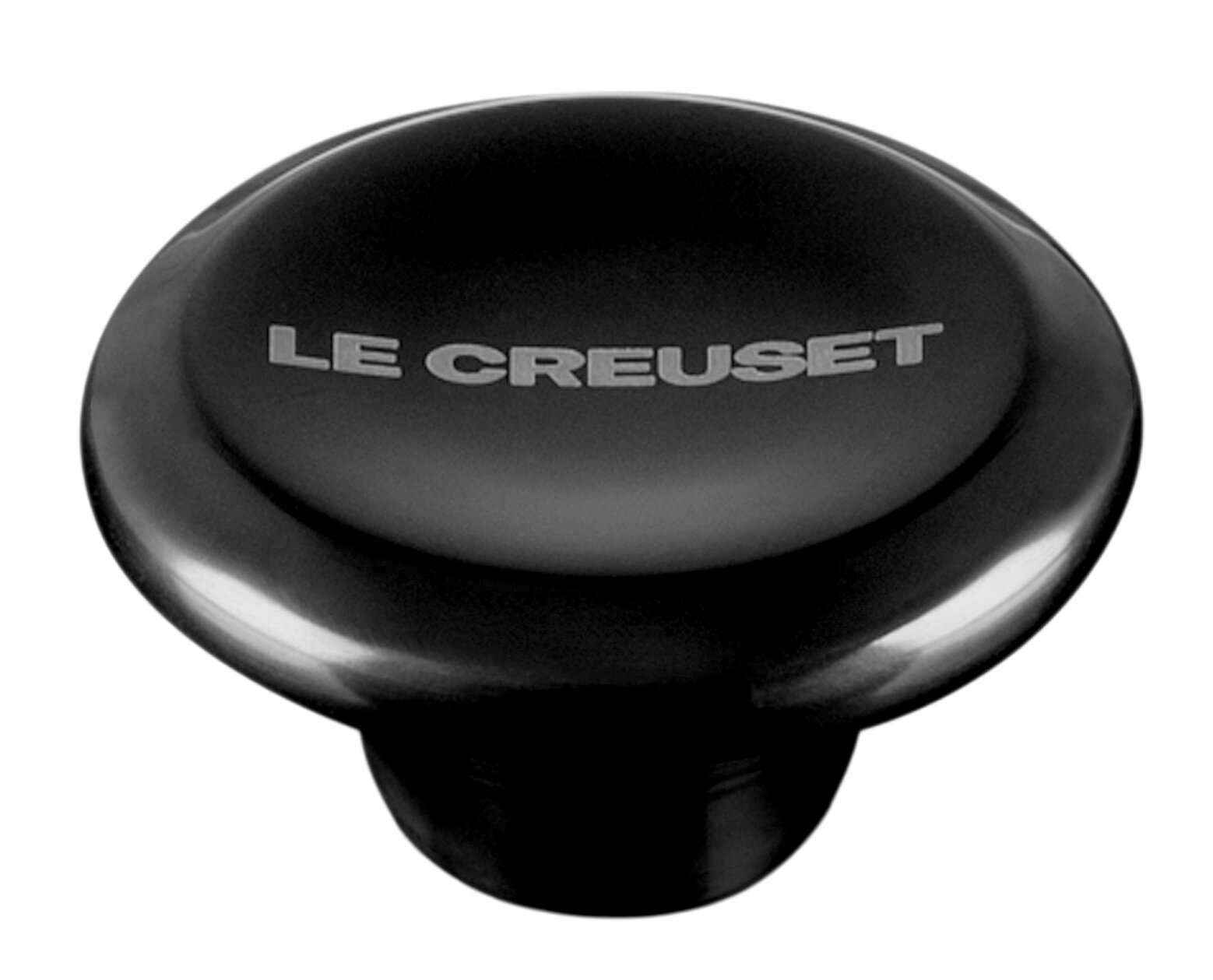 Schwarzer Deckelknopf aus Nickel mit der Aufschrift 'Le Creuset', Ansicht von oben.