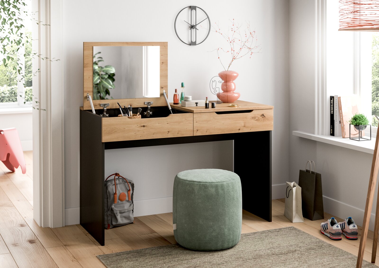 Schminktisch mit Klappspiegel und Stauraum in Eiche-Optik mit schwarzen Seitenteilen, frontale Ansicht in hellem Raum mit rundem Hocker davor